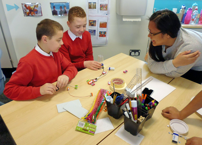 ArtLab facilitator Amal working with group