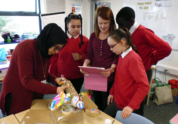 Class teacher Rachel Sims documenting construction of the creature