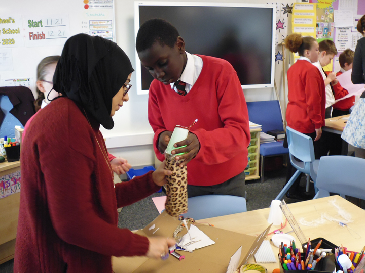 ArtLab facilitator Sahar working with group